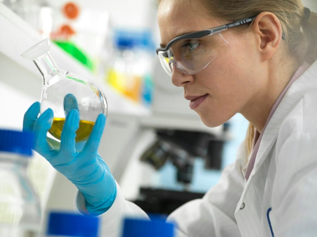 Scientist preparing a chemical formula in the laboratory