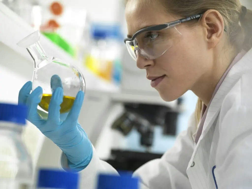Scientist preparing a chemical formula in the laboratory